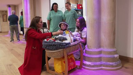 Little Charlotte helps Princess Kate prepare baby gifts