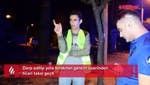 Darp edilip yola bırakılan gencin üzerinden ticari taksi geçti