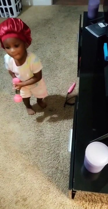 Baby Tries Lifting Weights