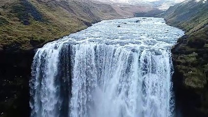 Waterfall amoung  the mountains