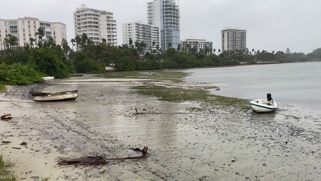 Water pulled out of bays as Hurricane Ian strikes Florida