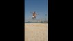 Guy Does Tricks While Balancing Himself Over Slackline