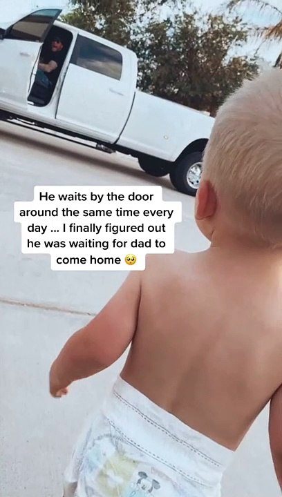 Baby waits by door every day for dad to come home