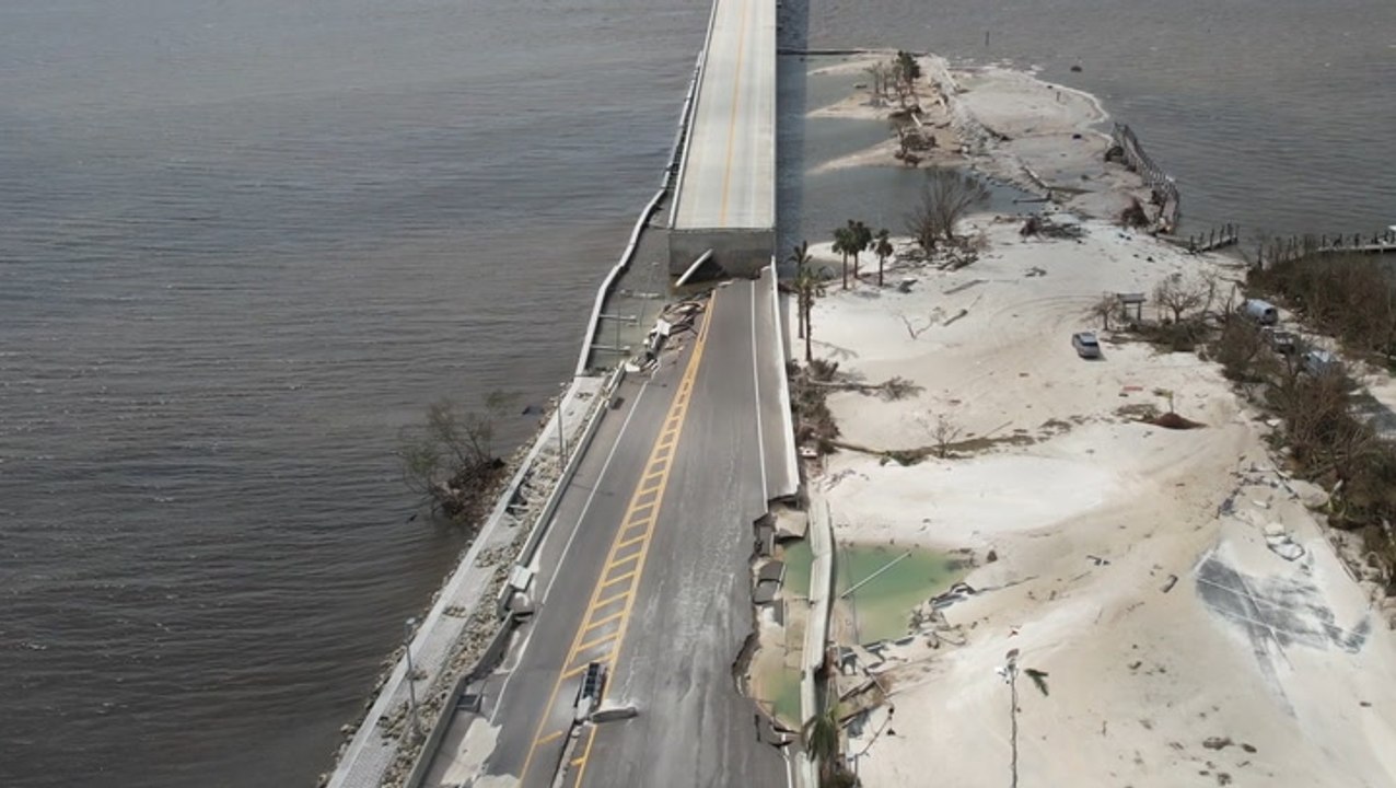 Collapsed causeway and destroyed pavement on roads