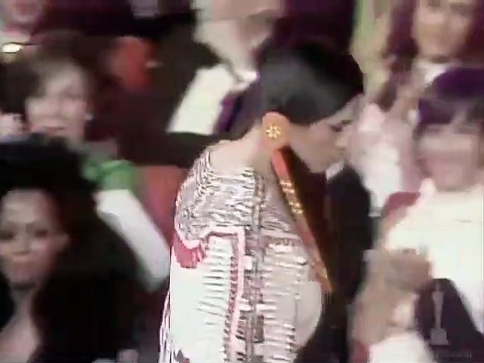 Sacheen Littlefeather accepts the Academy Award for Best Actor on behalf of Marlon Brando
