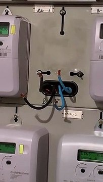 Los contadores de luz en uno de los edificios okupados de Badalona