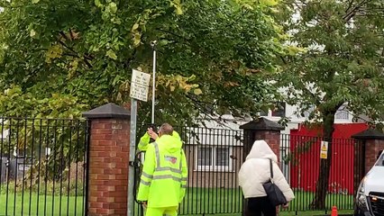 Traffic outside Cardinal Newman College
