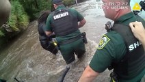 Deputies save woman from rushing floodwaters in Orlando