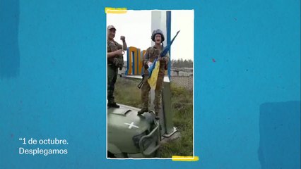 Soldados ondean la bandera de Ucrania a las puertas de Liman