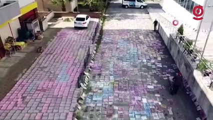 Selde ıslanan resmi evraklar tek tek kurutuluyor