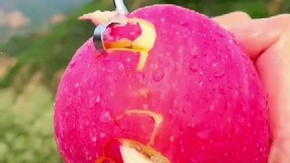 Apple cutting fruit.