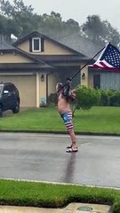 Hurricane Ian Welcomed by Man Waving America Flag