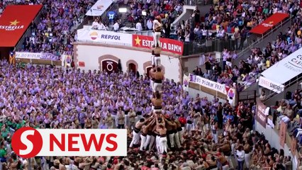 Catalans compete to build highest human towers