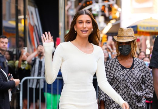 Hailey Bieber s Plunging Ruffled Midi Dress Just Threw Fall Fashion Rules Out the Window