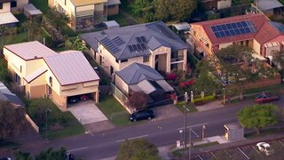 Brisbane man shot dead across the street from primary school