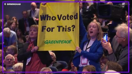 Watch Greenpeace protesters interrupt Liz Truss speech