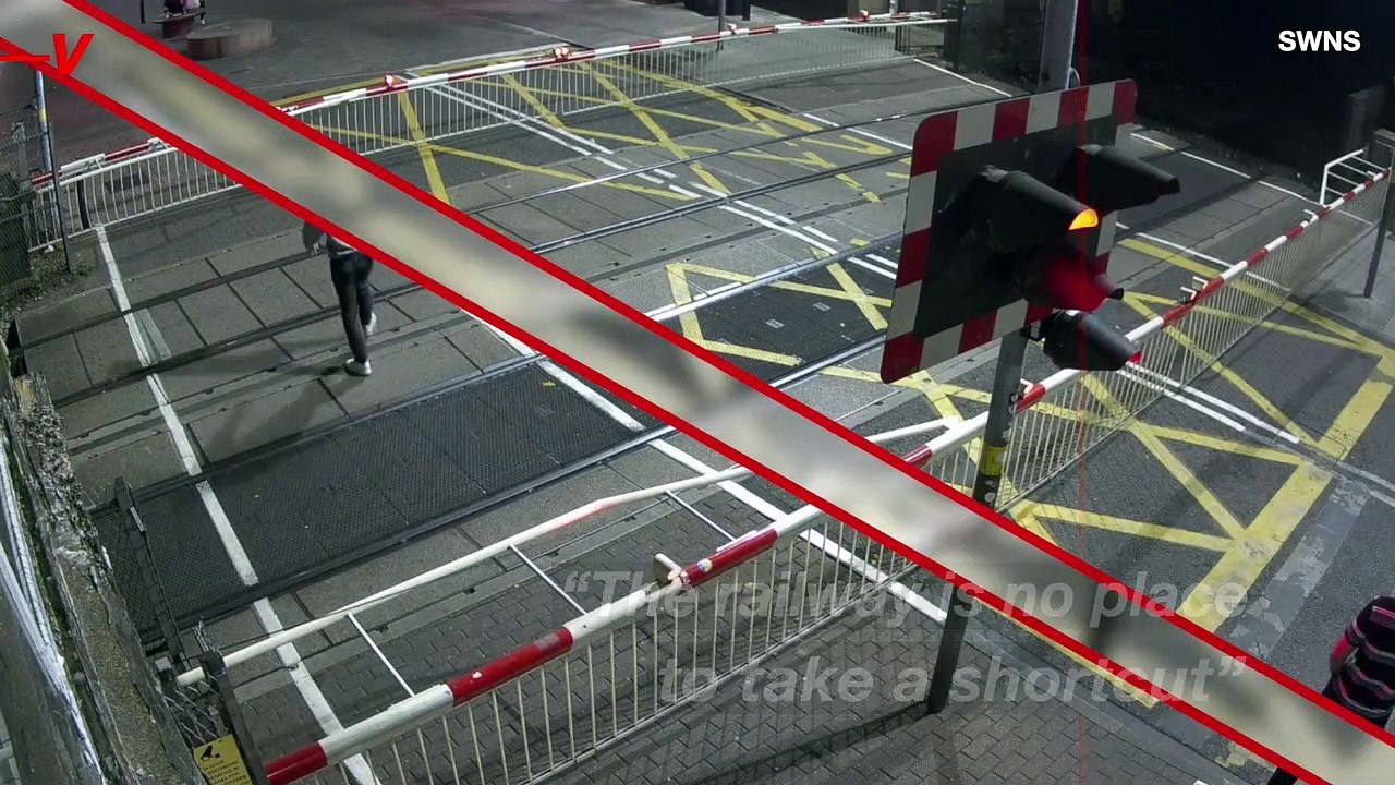 Video of Young Man Flirting With Death as He Crosses Railway Tracks Moments Before Train Thunders Past