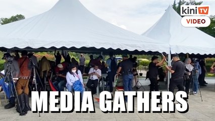 Reporters gather outside Istana Negara anticipating PM's arrival