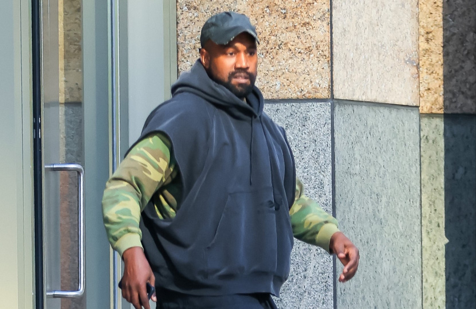 ⁣Kanye West's decision to wear a 'White Lives Matter' t-shirt stemmed from a 'con