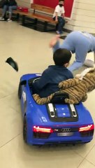 Lady Trips on Kid Driving Toy Car