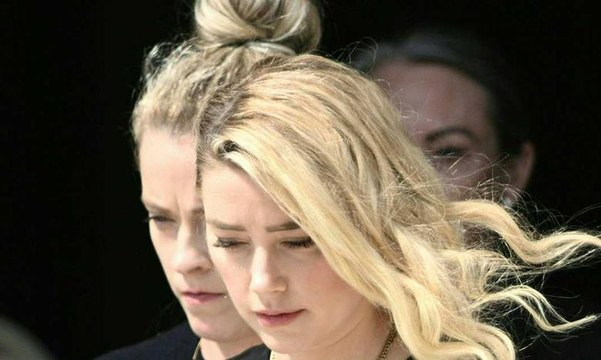 آمبر هيرد تقرر إصدار كتاب يروي قصتها لدفع تعويضات جوني ديب