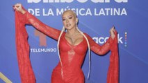 Christina Aguilera Wore a Red-Hot Lace Dress With the Longest Sleeves and Pantaboots