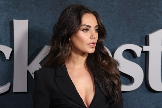 Mila Kunis Paired the Deepest Plunging Blazer With the Tallest Thigh High Boots