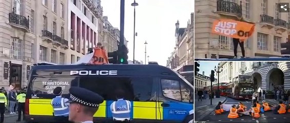 Tải video: 'I have to go to hospital... stop interfering with us!' Furious motorists DRAG Just Stop Oil protesters out of the road on day nine of protests - while one eco activist clambers on top of a police van