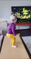 This toddler is most definitely a future metalhead