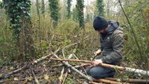 Building complete and warm survival shelter _ Bushcraft earth hut, grass roof & fireplace with clay
