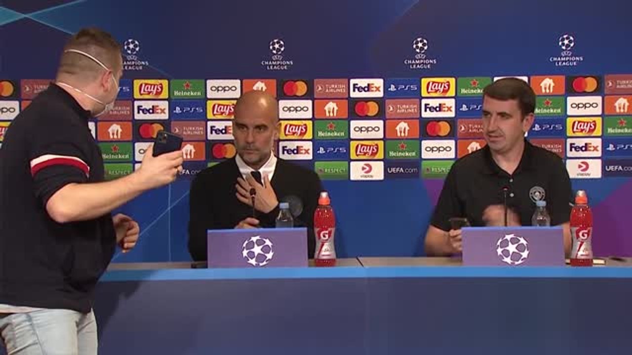 Awkward moment as journalist struggles to snap Pep selfie