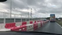 Video footage shows a confused motorist cruising along a barricaded section of dual carriageway
