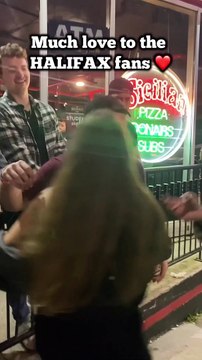 DJ Blitz taking pictures with fans in Halifax, NS