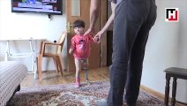Kızına 150 liraya yaptığı düzenekle yeniden yürümeyi öğretti