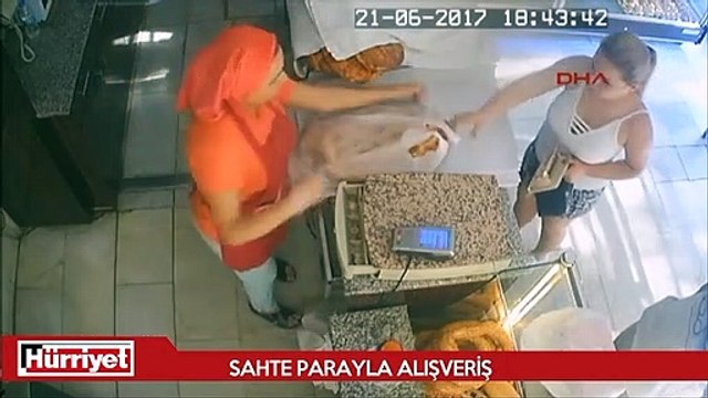 Sahte parayla alışveriş... Polisle kovalamaca...