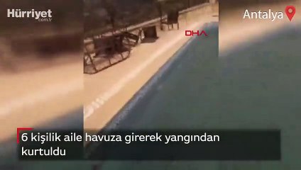 6 kişilik aile havuza girerek yangından kurtuldu
