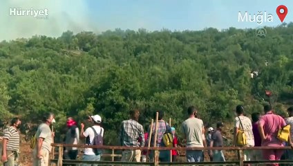 Seydikemer'deki orman yangını zeytin bahçelerine sıçradı