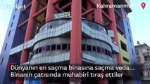 Dünyanın en saçma binasına saçma veda... Yıkıma dikkat çekmek için binanın çatısında muhabiri tıraş ettiler