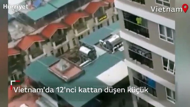Vietnam'da 12'nci kattan düşen küçük kızı kurye kurtardı