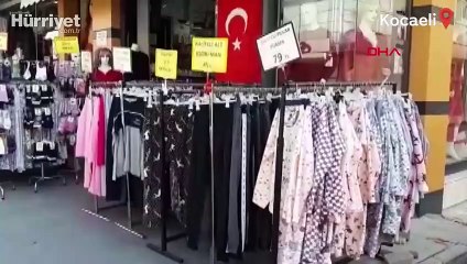 Çaldığı eşofmanı giyip mağazanın önünden geçince yakalandı
