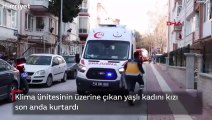Klima ünitesinin üzerine çıkan yaşlı kadını kızı son anda kurtardı
