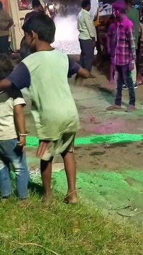 Is the child dancing in his mother's lap listening to the song?