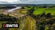 Drone footage shows how water levels at UK reservoir have fallen to just 20 per cent following droughts