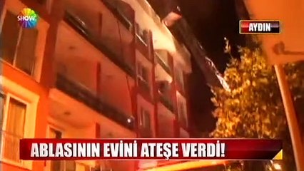 Ablasının evini yakıp balkondan seyretti.