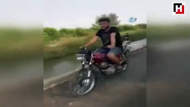 Sulama kanalında sörf yapan Adanalı