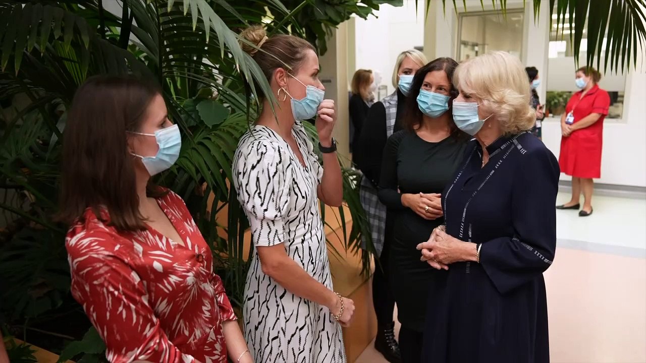 Queen Consort coos over newborn baby on hospital visit