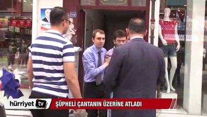 AK Parti önüne bırakılan şüpheli çantanın üzerine atladı
