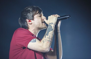 Louis Tomlinson reacts to Niall Horan's coaching role on The Voice