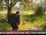 KAFASI KONSERVE KUTUSUNA SIKIŞTI