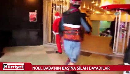 Noel Baba'nın başına silah dayadılar